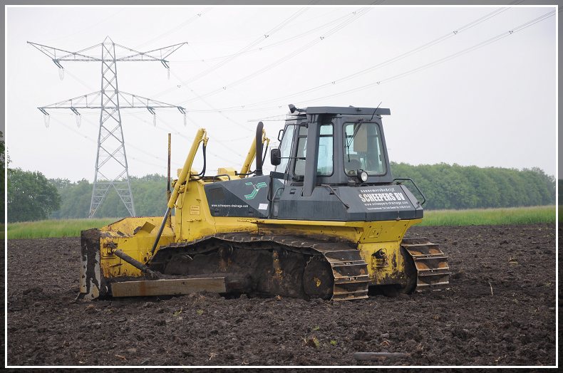 Komatsu D65 EX Scheepers bv-border.jpg