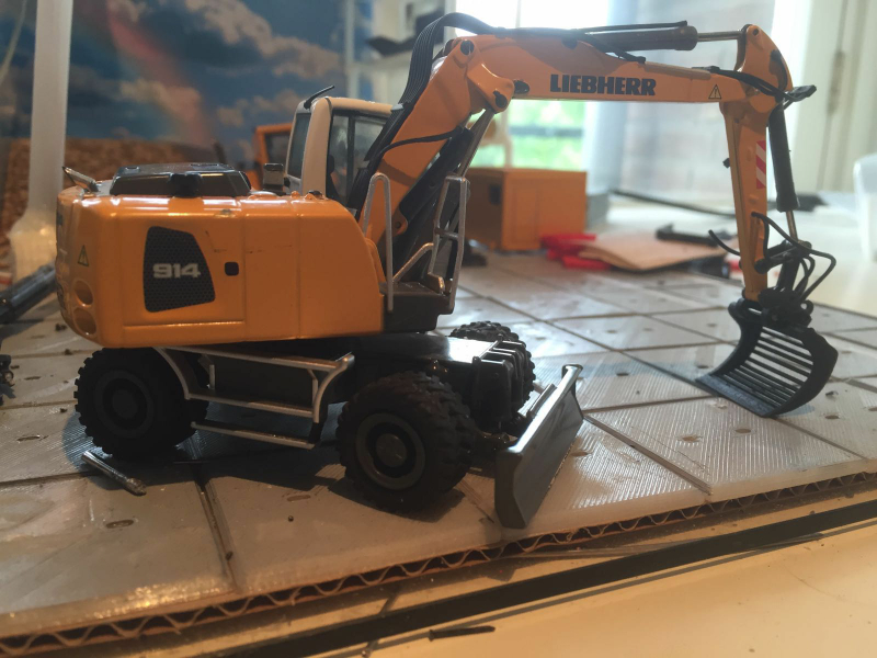 Liebherr 914 met economie bak